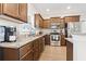 Well-equipped kitchen featuring stainless steel appliances, stylish granite countertops, and modern finishes at 211 Copperwood Loop, Conway, SC 29526