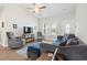 Comfortable living room with natural light, a vaulted ceiling, and neutral wall colors at 211 Copperwood Loop, Conway, SC 29526
