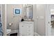 Bathroom featuring white vanity with marble top and decorative mirror at 2180 Waterview Dr. # 713, North Myrtle Beach, SC 29582