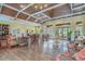 Spacious clubhouse with beautiful wood floors, coffered ceiling, elegant furnishings, and ample natural light at 2180 Waterview Dr. # 713, North Myrtle Beach, SC 29582