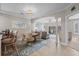 Charming dining area with a round table and seating for four, complemented by an open-concept living space at 2180 Waterview Dr. # 713, North Myrtle Beach, SC 29582