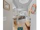 Inviting entryway showcasing an open-concept layout with tile flooring and neutral tones leading to a dining and living area at 2180 Waterview Dr. # 713, North Myrtle Beach, SC 29582