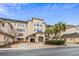 Exterior view of luxury building with covered entrance, porte-cochere, and manicured landscaping at 2180 Waterview Dr. # 713, North Myrtle Beach, SC 29582