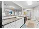 Bright kitchen featuring white cabinets, granite countertops, and stainless steel dishwasher at 2180 Waterview Dr. # 713, North Myrtle Beach, SC 29582
