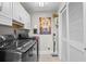Laundry room featuring modern washer and dryer, ample storage, and neutral colors at 2180 Waterview Dr. # 713, North Myrtle Beach, SC 29582