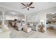 Open-concept living area with comfortable seating, leading into the kitchen and dining space for easy entertaining at 2180 Waterview Dr. # 713, North Myrtle Beach, SC 29582