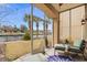 Screened-in porch with comfortable seating, offering a relaxing outdoor space with scenic views at 2180 Waterview Dr. # 713, North Myrtle Beach, SC 29582
