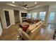 A spacious living room featuring hardwood floors, neutral paint and plenty of natural light at 2441 Capri Court, Conway, SC 29527