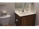 Bathroom features include a toilet, vanity with sink, mirror, and storage cabinet at 259 19Th Ave. S, Myrtle Beach, SC 29577