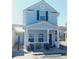 Charming two-story home with a welcoming porch and neat landscaping at 259 19Th Ave. S, Myrtle Beach, SC 29577