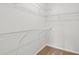 Walk-in closet with neutral carpet and wire shelving for optimal organization at 261 Six Mile Creek Dr., Georgetown, SC 29440