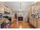 Open-concept kitchen with stainless steel appliances, center island, and ample cabinet space at 3618 Highway 430, Nichols, SC 29581