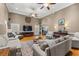 Comfortable living room with hardwood floors, ceiling fans, and an open layout at 3618 Highway 430, Nichols, SC 29581