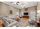 Bright and airy living room with hardwood floors, ceiling fan, and stylish furnishings at 3618 Highway 430, Nichols, SC 29581