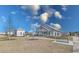 Community clubhouse with modern architecture, lush landscaping, and outdoor gathering spaces at 404 Cattle Drive Circle, Myrtle Beach, SC 29588