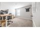 Bright home office with modern furniture and window that brings in natural light at 404 Cattle Drive Circle, Myrtle Beach, SC 29588