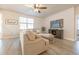 Inviting living room featuring a comfortable sofa, modern decor, and ample natural light at 404 Cattle Drive Circle, Myrtle Beach, SC 29588