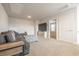 Cozy living room features a large TV, comfortable couch, and neutral tones at 404 Cattle Drive Circle, Myrtle Beach, SC 29588