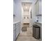 Convenient mud room featuring coat hooks, storage baskets, and easy access to the laundry area at 404 Cattle Drive Circle, Myrtle Beach, SC 29588