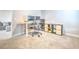 This office space features two monitors, neutral paint and carpet, and built in shelves for storage at 404 Cattle Drive Circle, Myrtle Beach, SC 29588