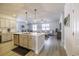 Spacious open concept layout seamlessly connects the kitchen, dining, and living areas at 404 Cattle Drive Circle, Myrtle Beach, SC 29588