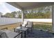 Relaxing screened patio with comfortable seating, perfect for enjoying the outdoors at 404 Cattle Drive Circle, Myrtle Beach, SC 29588