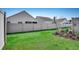 Well maintained backyard with a privacy fence and lush green grass at 4123 Mclamb Ave. # 4123, Little River, SC 29566