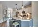Open-concept kitchen featuring a spacious island with barstool seating at 4123 Mclamb Ave. # 4123, Little River, SC 29566