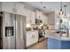 Modern kitchen with stainless steel appliances, white cabinetry, and granite countertops at 4123 Mclamb Ave. # 4123, Little River, SC 29566