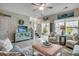 Cozy living room featuring stylish furnishings, a ceiling fan, and access to the outdoor area at 4123 Mclamb Ave. # 4123, Little River, SC 29566