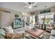 Comfortable living room with sofa, chairs, TV, and a sliding door to the outside at 4123 Mclamb Ave. # 4123, Little River, SC 29566