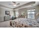 Relaxing main bedroom featuring a tray ceiling, soft lighting, and charming coastal accents at 4123 Mclamb Ave. # 4123, Little River, SC 29566