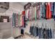 Well-organized walk-in closet with ample hanging space and shelving for clothing and accessories at 4123 Mclamb Ave. # 4123, Little River, SC 29566