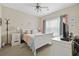 Bright bedroom with a ceiling fan, large window, and coordinating furniture at 4142 Hibiscus Dr. # 104, Little River, SC 29566
