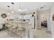 Bright kitchen features a breakfast bar, white cabinets, and modern appliances at 4142 Hibiscus Dr. # 104, Little River, SC 29566
