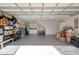 Well-organized garage with storage shelves, washer, dryer and ample room for parking and other storage needs at 4243 Rivergate Ln., Little River, SC 29566