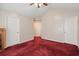 Open living space with multiple doors, vaulted ceiling, and ceiling fan at 4243 Rivergate Ln., Little River, SC 29566