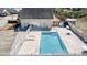 Community pool with lounge chairs, providing a relaxing outdoor space with room for entertaining neighbors and guests at 4243 Rivergate Ln., Little River, SC 29566