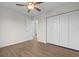 Bedroom with wood-look flooring and spacious closets at 4387 Heartwood Ln., Myrtle Beach, SC 29579