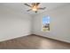 Bedroom with ceiling fan and bright window view at 4387 Heartwood Ln., Myrtle Beach, SC 29579
