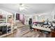 Bright bedroom with wood floors, a lofted bunk, cozy stairs, and windows for natural light at 450 Deer Spring Loop, Georgetown, SC 29440