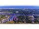 Overhead perspective of a marina community and distant beach with city skyline backdrop at 4637 Lightkeepers Way # 4-A, Little River, SC 29566