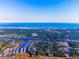 Panoramic aerial shot showcases a vibrant community near waterfront and picturesque distant city at 4637 Lightkeepers Way # 4-A, Little River, SC 29566