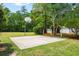 Community basketball court on a well-maintained lawn surrounded by trees and landscaping at 494 Battey Dr., Myrtle Beach, SC 29588