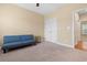 Bedroom featuring carpet, a ceiling fan, and a double door closet for plenty of storage at 494 Battey Dr., Myrtle Beach, SC 29588