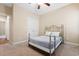 Comfortable bedroom with carpeted floors and a ceiling fan at 494 Battey Dr., Myrtle Beach, SC 29588