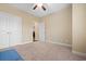 A bedroom features plush carpet, white trim, and a ceiling fan for added comfort at 494 Battey Dr., Myrtle Beach, SC 29588