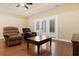 Cozy living room with hardwood floors, comfortable seating, and access to the patio at 494 Battey Dr., Myrtle Beach, SC 29588