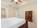 A bright main bedroom with a decorative ceiling fan and large windows at 494 Battey Dr., Myrtle Beach, SC 29588