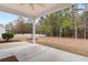 Covered back patio offering a tranquil outdoor space overlooking the large backyard at 494 Battey Dr., Myrtle Beach, SC 29588